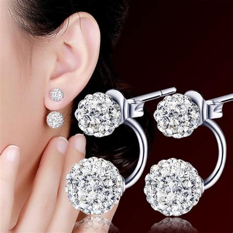 ladies designer stud earrings.